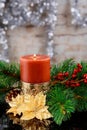 New year copyspace card. Christmas tree fir branch, burning candle, colorful lights garland, dry oranges, Royalty Free Stock Photo
