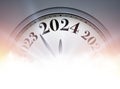 New Year 2024 countdown clock on beautiful silver background with sunbeams