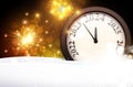 New Year 2024 countdown clock with golden blurred lights and fireworks