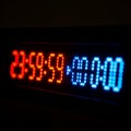 New Year Countdown: Digital Clock Transition from 23:59:59 to 00:00:00 Royalty Free Stock Photo