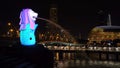 New Year Countdown 2019 at Merlion with colorful lights in Downtown Singapore City at night with skyscraper buildings background