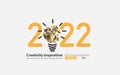 2022 new year creativity inspiration with crumpled paper ball light bulb ideas Royalty Free Stock Photo