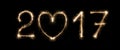 New year date, sparkler numbers on black background Royalty Free Stock Photo