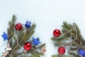 New year decorations of pine branches and christmas tree and copy space in the middle. Royalty Free Stock Photo