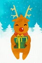 New year deer Rudolf with a gift Royalty Free Stock Photo