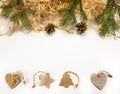 New Year. Design on a white background. Festive decorations made of natural materials - fir branches, cones, wooden shavings, Chri Royalty Free Stock Photo