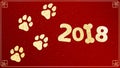 The new year 2018 of the dog. Golden traces in grunge style. Gold dust on a red background with a pattern. Chinese zodiac. The sym Royalty Free Stock Photo