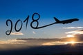 New year 2018 drawing by airplane on the air at sunrise Royalty Free Stock Photo