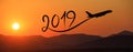 New year 2019 by flying airplane on the air at sunrise, banner