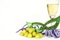 New Year Eve party favors next to glass of Champagne and grapes Royalty Free Stock Photo