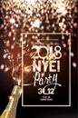 New year eve party invitation card with defocuced lights on the background, bottle of champagne and serpentine.