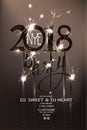 New year eve 2018 party invitation card with sparklers and serpentine. Royalty Free Stock Photo