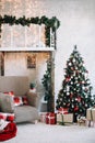 New Year festive interior. Holiday concept. Decorated Christmas tree with gifts. Decorated Christmas porch. Royalty Free Stock Photo