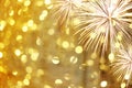 New year fireworks on golden bokeh background and have copy space. Royalty Free Stock Photo