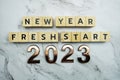 New Year Fresh Start 2023 text on marble background