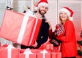 New year gift. Gift from Santa Claus. Man and woman with gift boxes. Family shopping. Seasonal sale. Guy with big gift Royalty Free Stock Photo