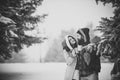 New year girl and guy in snowy forest. Royalty Free Stock Photo