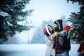 New year girl and guy in snowy forest. Royalty Free Stock Photo