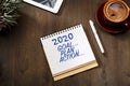 2020 new year goal, plan, action text on notepad. Business motivation, inspiration concepts Royalty Free Stock Photo