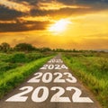 New Year 2022 Goals Concept : Empty asphalt road sunrise with text go to New year 2022 Royalty Free Stock Photo