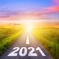 New Year Goals Concept : Empty asphalt road sunset and Happy New Year 2021 Royalty Free Stock Photo