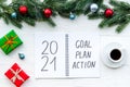 2021 New Year goals and plan with Christmas decorations and gift box. Overhead Royalty Free Stock Photo