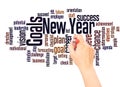 New Year Goals word cloud and hand with marker concept Royalty Free Stock Photo