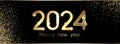 New Year 2024 golden shiny numbers for calendar on black background with gold sand or small foil particles