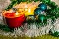 New year, green balls and decorations for the Christmas tree. Bright and beautiful scenery on a lemon background with white tinsel