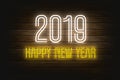 New year greeting 2019 brite neon lights design. wooden bg