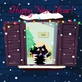 New year greeting card of funny cartoon cat catching snow flakes on window Royalty Free Stock Photo