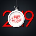 2019 New Year greeting card with hand lettering holiday greetings Happy New Year and christmas ball. Royalty Free Stock Photo