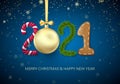 New Year 2021. Greeting card with 2021 lettering. Candy and golden Christmas ball, New Year tree branch and Christmas gingerbread Royalty Free Stock Photo