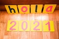 New year greeting 2021 in Spanish with the word hello