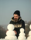 New year guy on blue sky with snow figure.