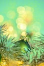 New Year Holiday greeting card. Beautiful green ball, pine branches