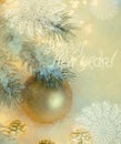 New Year Holiday greeting postcard. Beautiful golden ball, pine branches and a garland in the snow. Royalty Free Stock Photo