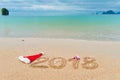 New year 2018 holiday vacation concept, 2018 written on tropical beach sand Royalty Free Stock Photo