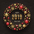 2019 New Year illustration. New year greeting in frame which is made from holiday decor on a dark wooden background. Royalty Free Stock Photo