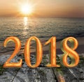 New Year inscription 2018 on the wooden road over the sea Royalty Free Stock Photo