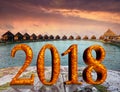 New Year inscription 2018 on the wooden road over the sea Royalty Free Stock Photo