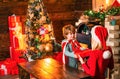 New year kids. Merry Christmas and Happy Holidays. Funny kid holding Christmas gift. Happy family - Brother and sister