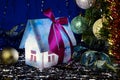 New Year luminous house and Christmas ball Royalty Free Stock Photo