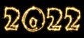 New Year 2022 made by sparkler . Number 2022 written sparkling sparklers . Isolated on a black background . Overlay template for Royalty Free Stock Photo