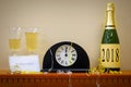 2018 New Year mantlepiece with midnight clock Royalty Free Stock Photo