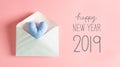New Year message with a blue heart cushion Royalty Free Stock Photo