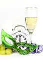 New Year at Midnight. Clock at twelve o'clock with glass of champagne Royalty Free Stock Photo