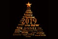 2019 new year multilingual text word cloud greeting card in shape of a christmas tree Royalty Free Stock Photo