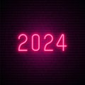 2024 New Year neon signboard on dark brick wall background.