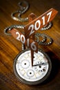 New Year 2017 - Old Pocket Watch with Signs Royalty Free Stock Photo